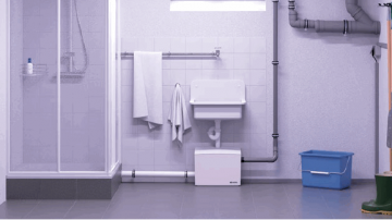 Minilift s afvoerpomp aangesloten op douche in de kelder